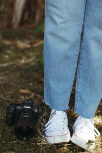 shoes and camera on the grass