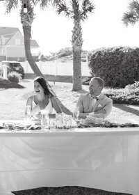 A couple watches the sunset on their Colorado elopement day
