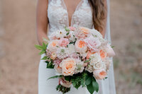 North shore wedding bride holding blush bouquet
