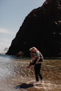 Engagement session in waterfall at Cannon Beach, Oregon