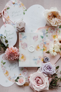 gold engagement ring and wedding rings for flatlay
