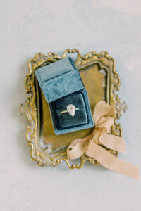 Diamond engagement ring in blue velvet box