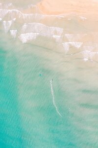waves on beach birds eye view