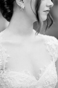 Showcase the sophistication and elegance of your wedding day with a close-up of bridal lace details and the groom’s classic bowtie, captured by Tiffany Longeway Photography, a renowned Bay Area wedding photographer.