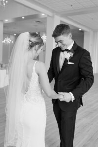 couple has first look on their wedding day smiling