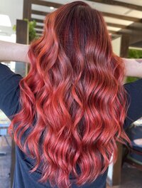 Woman with long very red hair