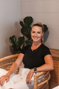 beautiful pilates instructor Maggie smiling