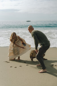 Orange County maternity announcement photography session at Laguna Beach