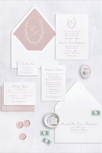 Luxury wedding invitation in cream and suede