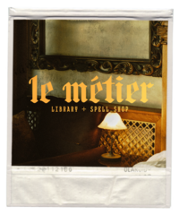 dark academia seating are with a logo for le metier library and spell shop