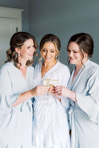 Bride with bridesmaids with hair by Sophia Kieley Hair