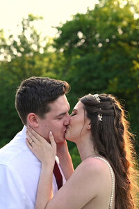For Indianapolis wedding videography,  Vallosio Photo + Film captures bride and groom kissing