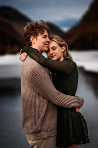 a couple hugs at cascade lakes in the adirondacks ny 