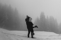 couple on mountain black and white image