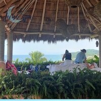 Luna Spa therapist delivering a soothing massage with a stunning ocean view in Sayulita, combining relaxation with the beauty of nature.
