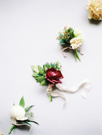 Colored Boutonnieres by Victorian Gardens Floral Design