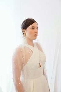 Capel-length wedding veil on a bride
