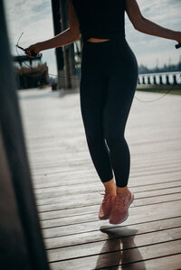 Canva - Woman on Dockside Doing Exercise