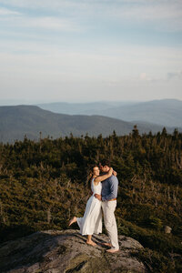 An engagement session on a New Hampshire summit. New Hampshire 52 with a view. 