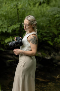 woman holding camera