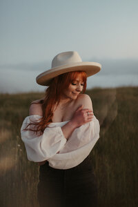 woman smiling while in the white mountains