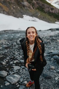 me and my camera adventuring around a glacier in alaska