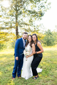 Eleanor Stenner with bride and groom at Birmingham wedding 