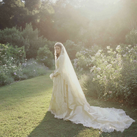 u8487914977_a_vintage_wedding_photo_of_a_beautiful_bride_in_a_cfadbac6-bddf-4bcb-be35-d23168f17807_1