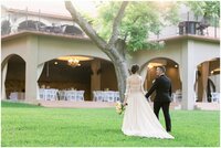 A couple walking on their wedding day in Wimberley Texas