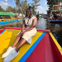 Black Woman Floating Gardens of Xochimilco in Mexico City