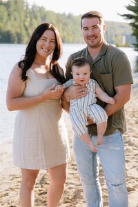 Light-filled family photography session on Ottawa beach with lifestyle portrait photographer Stacy Kenopic, capturing candid moments with young children