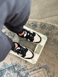 Woman standing on a scale