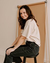 A professional headshot of Jordin Brinn, owner of Unica Formo, the website design agency known for creating beautiful, functional websites.