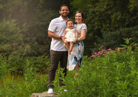 Family photos at Raleigh Rose Garden at sunset celebrating first birthday