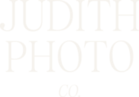 White version of the Judith Photo Co. logo.