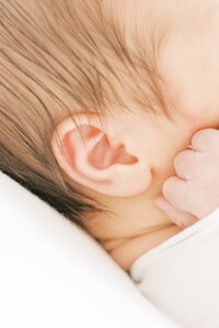 detal show of babys ear at newborn photo session