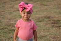 a toddler girl smiling