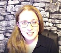 Nicole, a young white woman with beachy blond hair, black all-business blazer and smart gold necklace