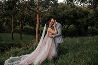 Framed wedding portrait of bride and groom embracing in forest, printed by Auckland wedding photographer Zanthe Vorsatz.