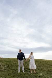 couple poses for portraits