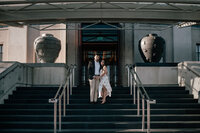 Framed wedding photo of bride and groom on city steps in Auckland, displayed as professional wall print by Zanthe Vorsatz Photography.