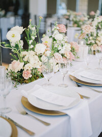 Dallas wedding tablescape from The Springs Valley View with gold chargers and blush and white florals