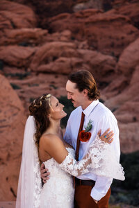 couple kissing on beach in rocky point