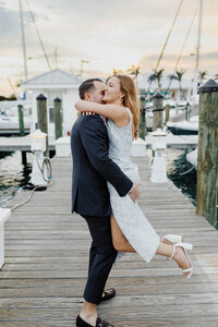 A photo of a couple holding one another 