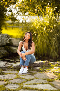 Vermont Senior Surrounded by Greenery in Trapps Family Lodge Stowe Vermont