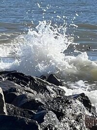 Waves crash on Edisto Beach Rocks
