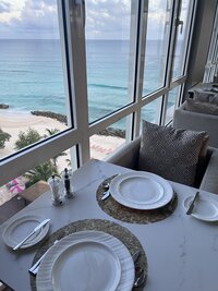 Table setting with ocean window view