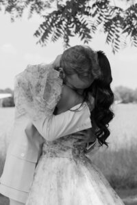 Candid moment with bride and groom by Southern California wedding photographer