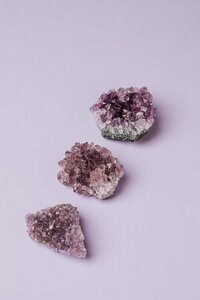 three purple rocks