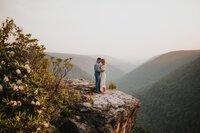 couple standing on mountainside